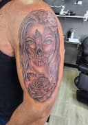 Ken's tattoo and body piercing logo