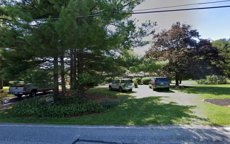 The Village Electrician Lamp Repair Shop logo