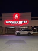 Sizzling Bites Reading logo