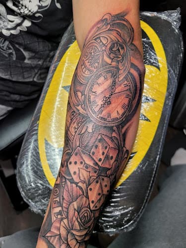 Out The Gutter & Inklife.co LLC Tattoos & body piercing logo