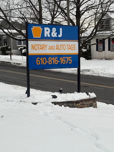 R & J Notary and Auto Tag logo
