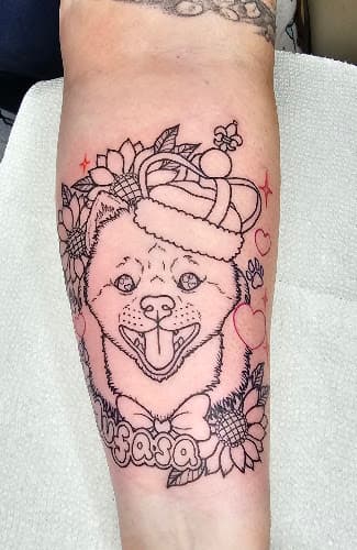 Sacred ink Tattoo logo