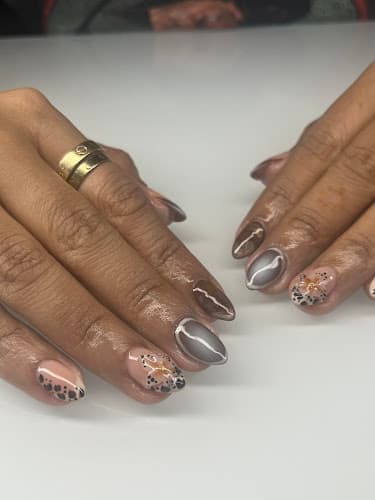 Tripl3mnailz logo