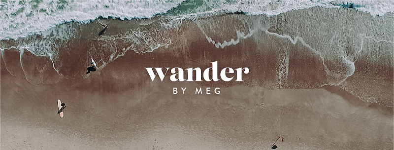 Wander by Meg logo