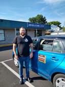 Unique Driving School logo