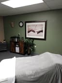 Knots in Knead Massage Therapy logo