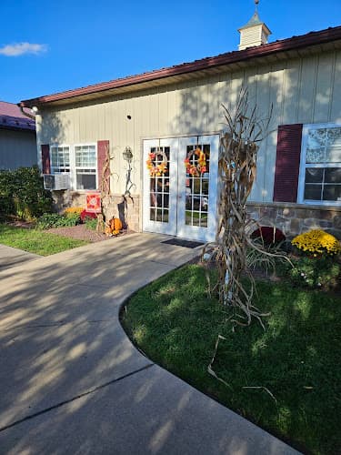 Tall Tails Training & Boarding logo