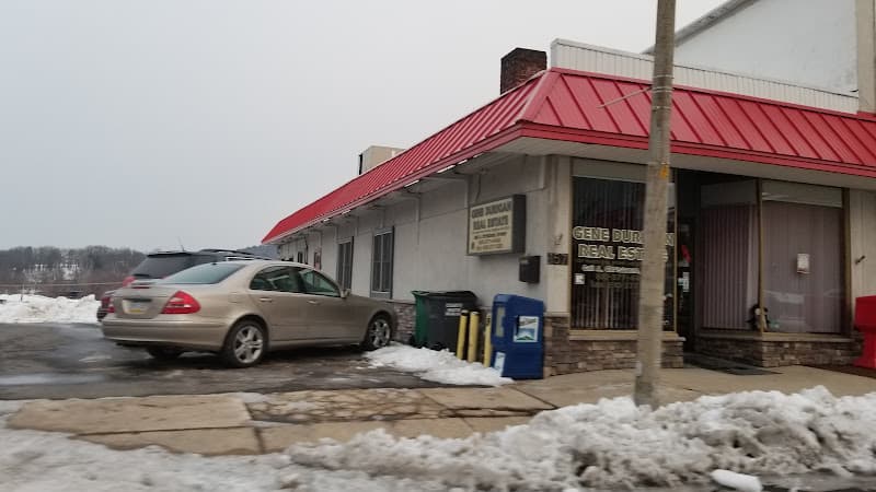 Kim Rabenold, Associate Broker at Gene Durigan Real Estate logo