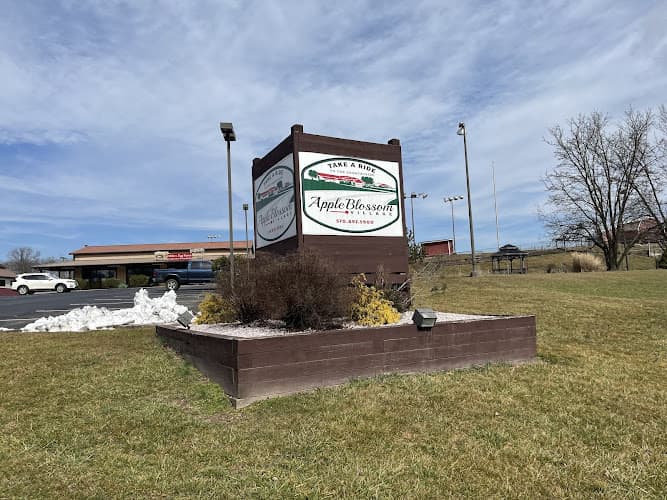 Apple Blossom Village logo