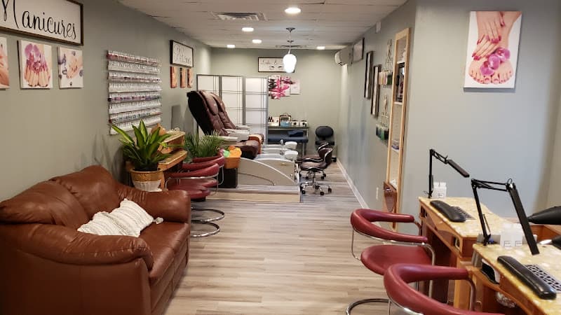 Tanning Station and Nail Salon logo