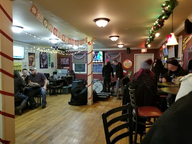 Spectators Bar & Grille logo