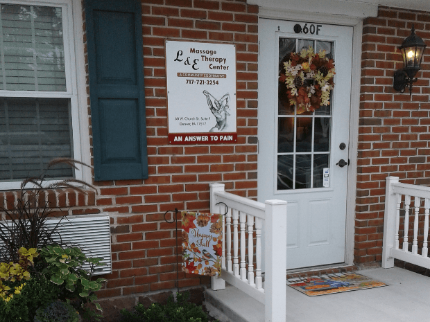 L and E Massage Therapy Center logo