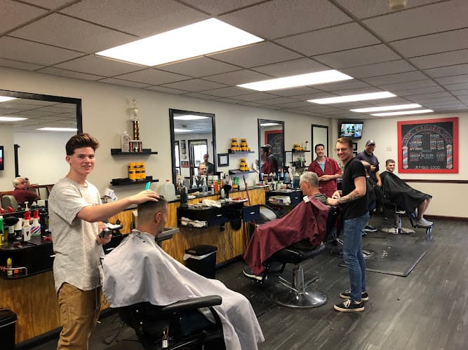 Chad's Barber Shop logo