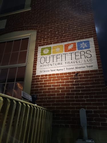 Outfitters Adventure Travel LLC logo