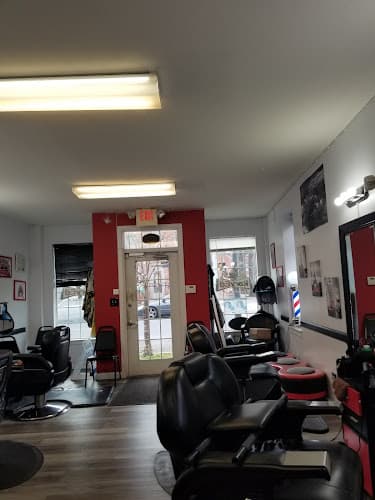 Karved Creations Barber Shop & Beauty Salon logo