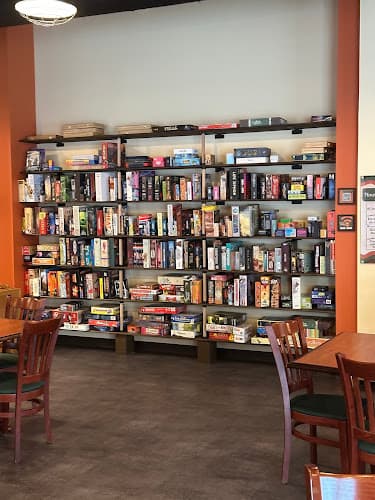 Mayhem's Bookstore & Board Game Café logo