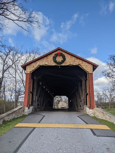 Historic Poole Forge Covered Bridge logo