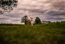 Photos by Emilly logo