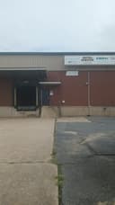 unconquered fitness and wellness logo