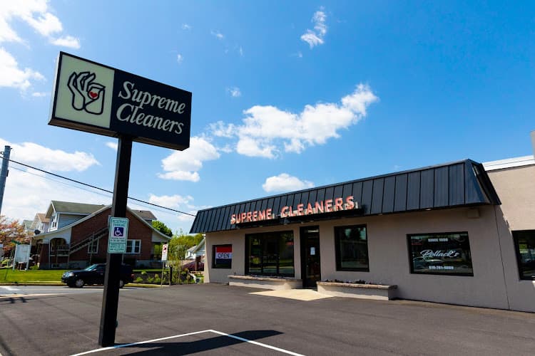 Supreme Cleaners logo