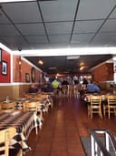 Nonno Alby's Brick-oven Pizza logo