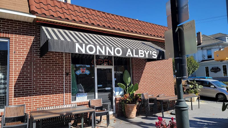 Nonno Alby's Brick-oven Pizza logo