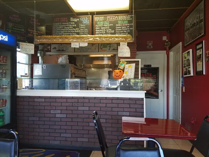 Bella's Subs and Pizza logo