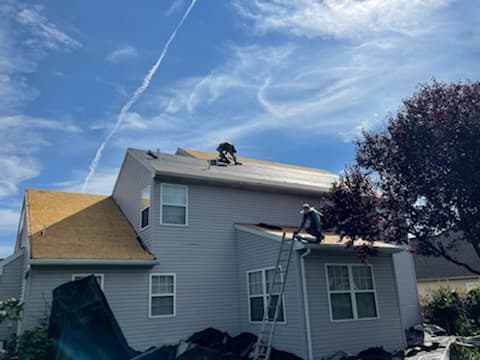 Scott Macczak Roofing - Mohnton Home Improvements Logo