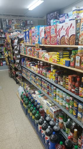STI Kitchen Grocery logo