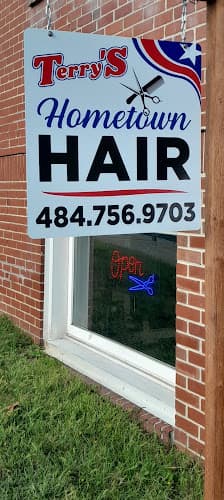 Terry's Hometown Hair logo