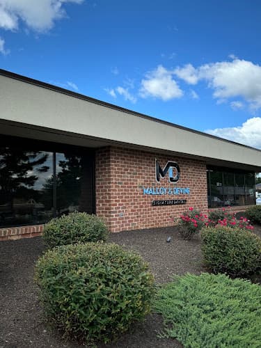 Malloy & Devine Signature Dental logo