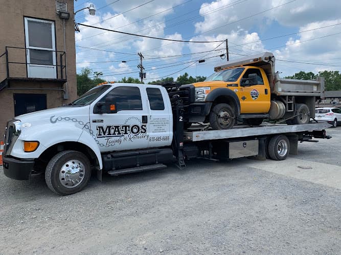 Matos Towing & Recovery - Heavy Duty Towing logo