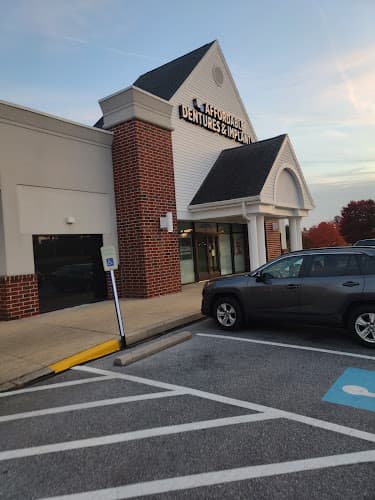 Affordable Dentures & Implants logo