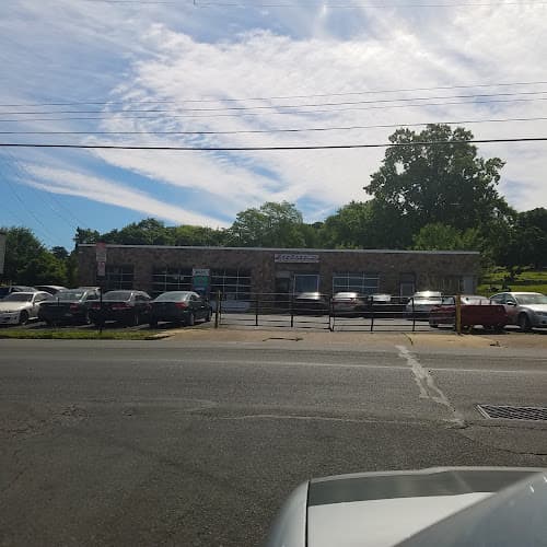 John's Auto Service & Repair logo