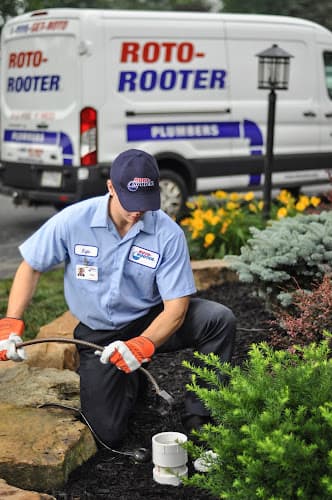 Roto-Rooter Plumbing & Water Cleanup Logo