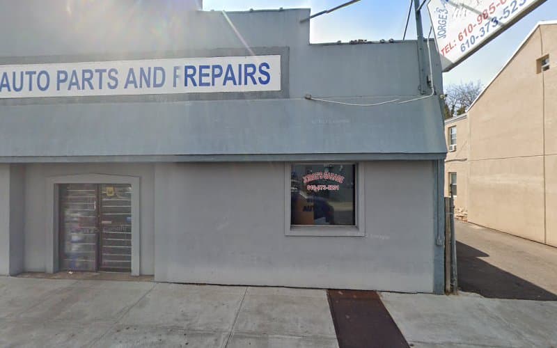 George's Auto Part & Repair logo