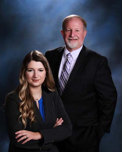 Greg Henry Law Firm logo