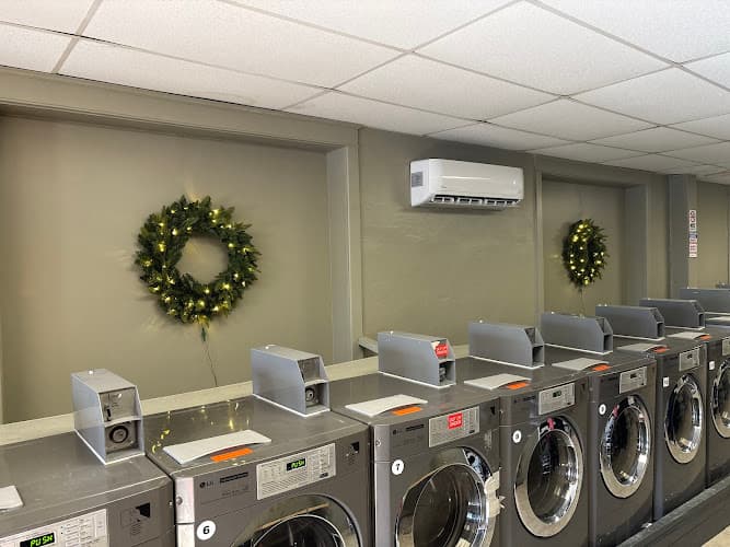 Spring Street Laundromat logo