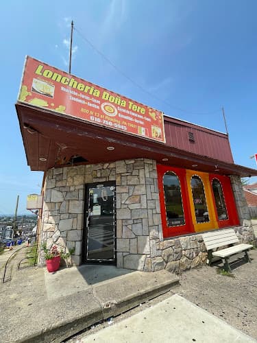 Loncheria & Panaderia Doña Tere logo