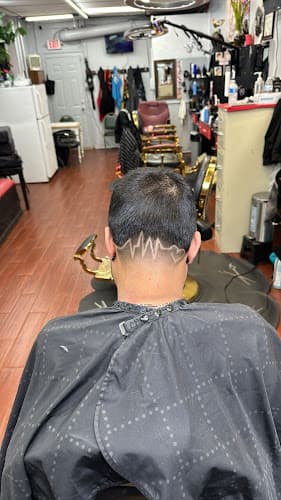 Fernandez barbershop logo