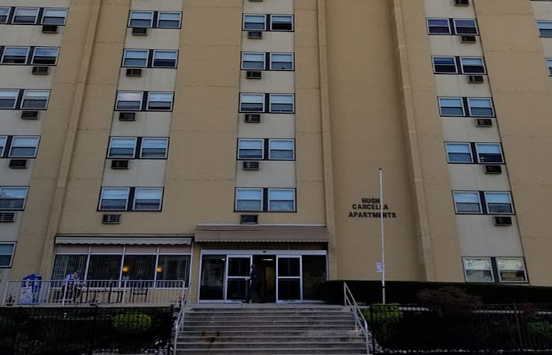 Hugh Carcella Apartments Logo