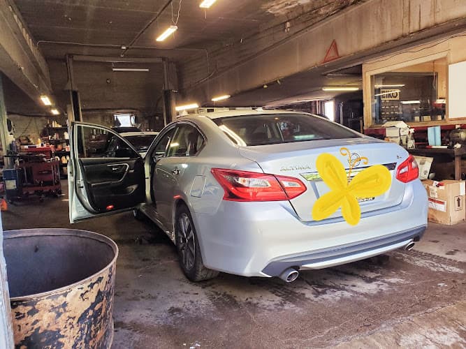 John Dianna Auto Repair Logo