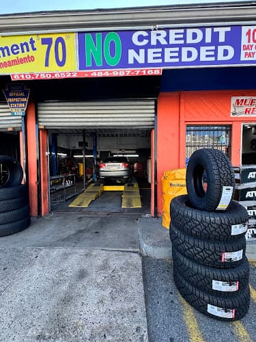 The Master Wheels and Tires + Master Tire Center logo