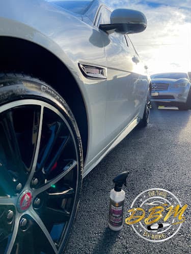 Detail By Mike Logo