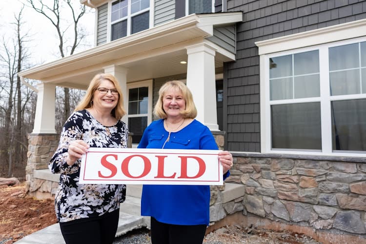 Deb Scheidt Realtor - Coldwell Banker Realty Logo