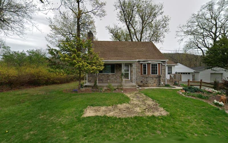 Ed Holland Trash Removal logo