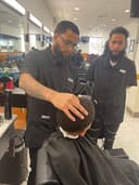 Cuts With Ed logo