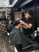 Crown & lens hair studio logo