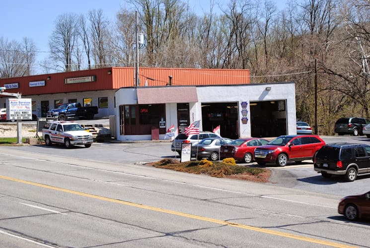 Jim Krueger Automotive Repair Logo