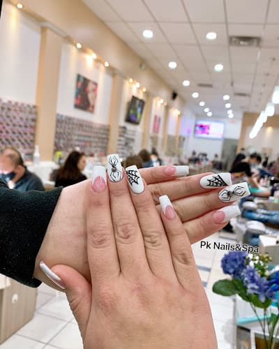 PK Nails And Spa logo